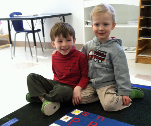 Preschool Montessori Boys -on-rug Preschool Montessori Boys at the Westwood Montessori.
